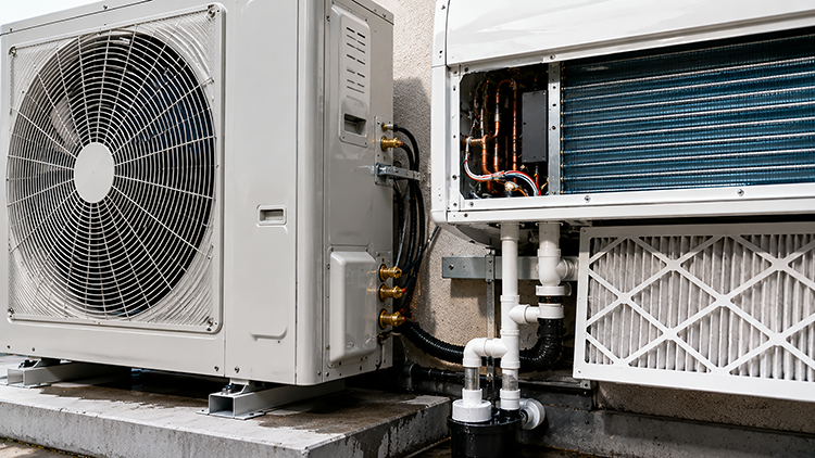 Commercial split system air conditioner components inspected during routine AC maintenance service by Sharkey Air Conditioning in Stuart, FL